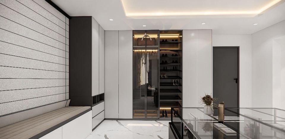 Dressing room design with an upholstered window bench, lit glass wardrobe and shoe display